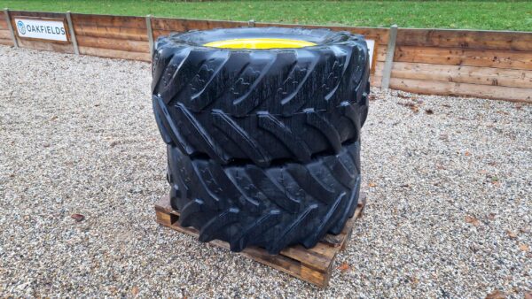 Pair of 540/65R24 BKT tyres on fixed rims